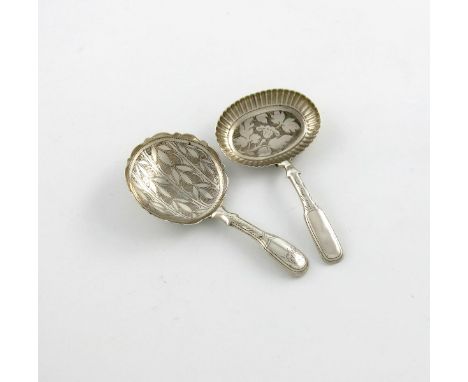 A George IV silver Fiddle pattern caddy spoon, by John Bettridge, Birmingham 1828, shaped circular bowl, with foliate engrave