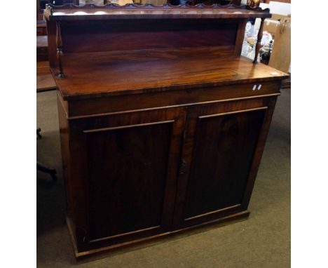 19th century mahogany chiffonier, the pediment with shelf supported by ring turned columns, full width frieze drawer over pan