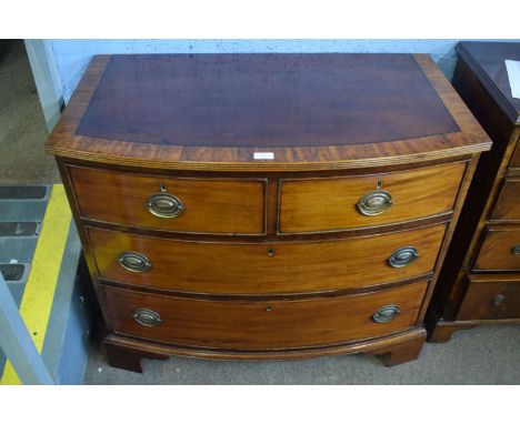 Mahogany bow fronted chest with cross banded top, over two short and two full width graduated drawers on bracket feet, 92cm w