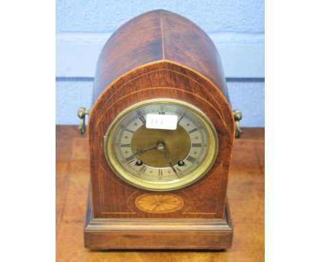 Late 19th century bracket clock of lancet shape, silvered Roman chapter ring, applied on either side with brass handles, 93cm