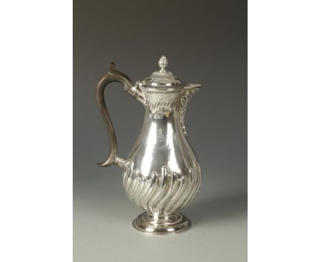 A VICTORIAN HOT WATER POT of baluster form with flame finial, wooden scroll handle and part-fluted decoration, crested, by Wi