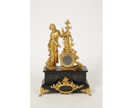 A VICTORIAN GILT SPELTER AND MARBLE MANTEL CLOCK, the circular dial signed "T. Schiemer Bordeau" with gilt numerals, with an 