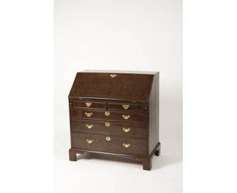A GEORGE III BURR YEW BUREAU, the sloping fall with broad crossbanding enclosing a fitted interior, with a central cupboard, 