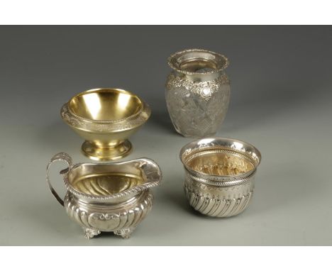 A VICTORIAN SILVER GILT SUGAR BOWL of tapering circular form, by The Barnards, London 1872, a cream jug, a Victorian sugar bo