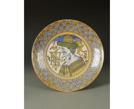 AN ITALIAN CANTAGALLI MAIOLICA CHARGER in Deruta style, with a central portrait within a scaled border, cockerel mark, 19th c