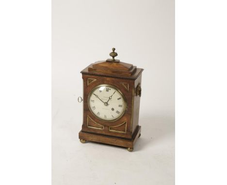A REGENCY ROSEWOOD MANTEL CLOCK by Swift of Fenchurch Street, London, the convex dial with Roman numerals, with a single trai