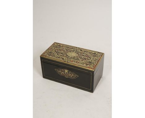 A FRENCH BOULLE WORK TEA CADDY, the rectangular top set with scrolling engraved brass against a red tortoiseshell ground, the