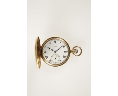 A GENTLEMAN'S 9CT YELLOW GOLD HALF HUNTING CASED POCKET WATCH, the white enamel dial with Roman numerals and subsidiary secon