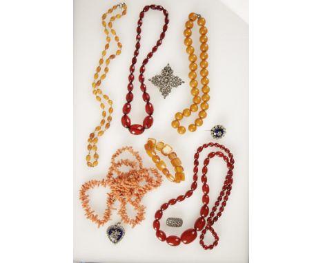 A COLLECTION OF JEWELLERY including a coral necklace, two Victorian white paste brooches, two white paste and enamel pendants