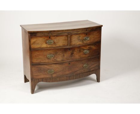 A REGENCY MAHOGANY BOWFRONT CHEST OF DRAWERS, with a crossbanded top above a brushing slide and two short and two long gradua