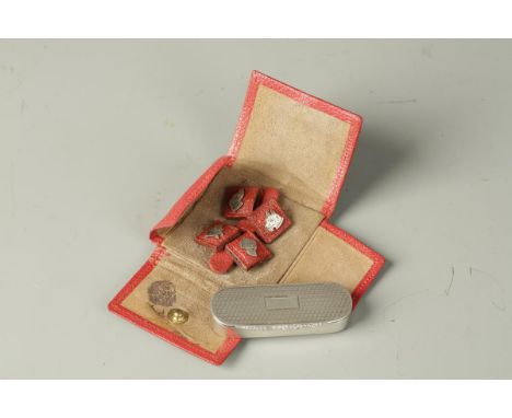 A VICTORIAN TRINKET BOX of shaped oval form with engine-turned decoration, with a later added striker to the side, by Taylor 