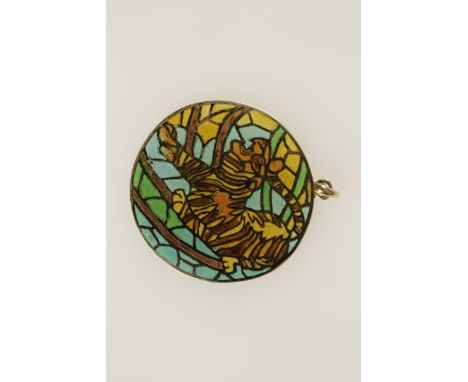 A FRENCH GOLD AND ENAMEL PENDANT, the circular pendant of plique a jour enamel depicting a roaring tiger in jungle settings, 