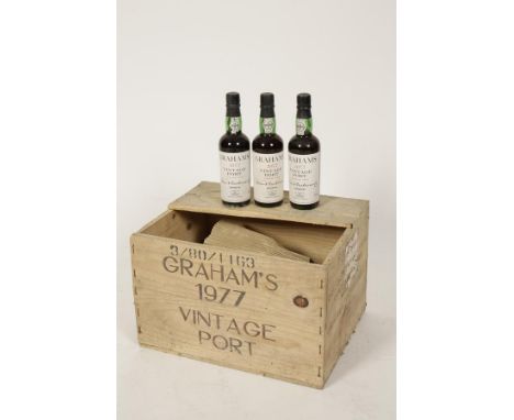 TWELVE HALF BOTTLES OF 1977 GRAHAM'S VINTAGE PORT, bottled 1979 in original wooden case (12 bottles)