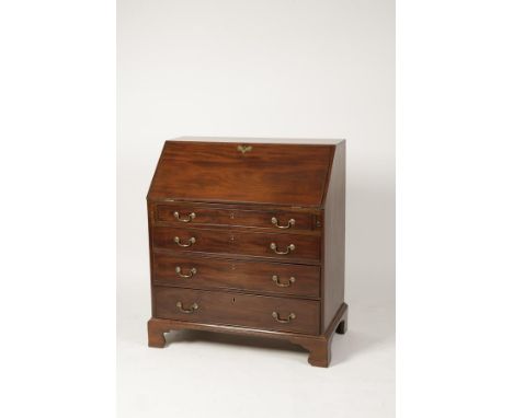A GEORGE III MAHOGANY BUREAU, the sloping fall enclosing a fitted interior with a central cupboard, flanked by short drawers 