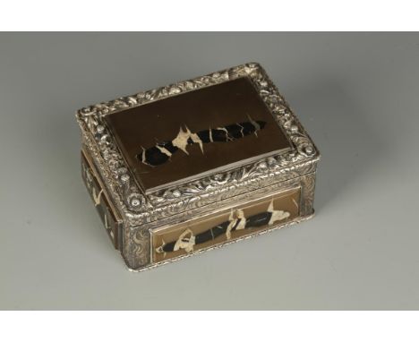 A VICTORIAN SILVER TABLE SNUFF BOX with relief carved and engraved rose thistle and shamrock borders, inset with bevelled pan