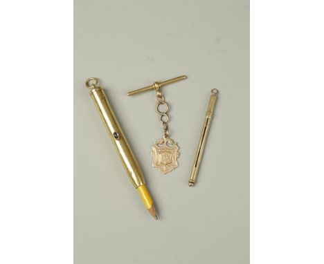 AN 18CT YELLOW GOLD POCKET PENCIL, with blue glass cabochon push-stud, a 9ct rose-gold watch fob, with 18ct yellow gold T bar