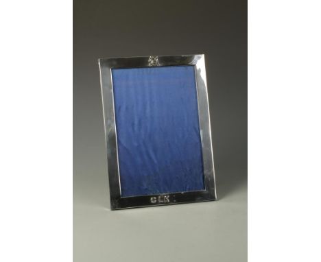 MILITARY INTEREST: A REGIMENTAL PRESENTATION PHOTOGRAPH FRAME of upright rectangular form, with wooden strut and back, the fr