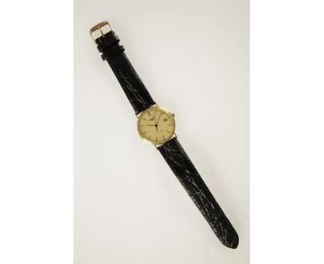 LONGINES: A GENTLEMAN'S 18K YELLOW GOLD WRISTWATCH, the gilt dial with baton numerals, date aperture and sweep seconds hand, 