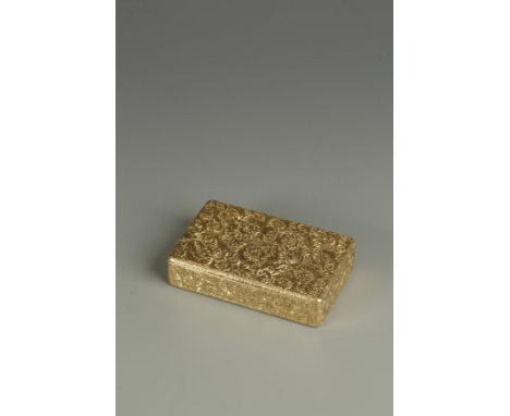 A VICTORIAN GOLD SNUFF BOX, with engraved scroll and floral decoration overall, the hinged lid revealing an engraved inscript