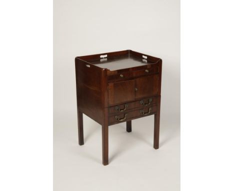 A GEORGE III MAHOGANY TRAY TOP COMMODE, the rectangular commode with a raised top with three pierced hand holds above a shall