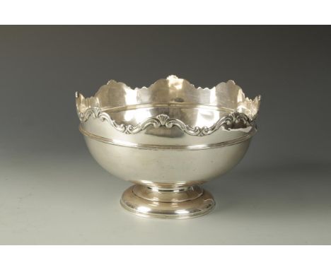 A ROSE BOWL of tapering circular form with a wavy border and reeded girdle on a tucked-in circular foot, by William Hutton & 