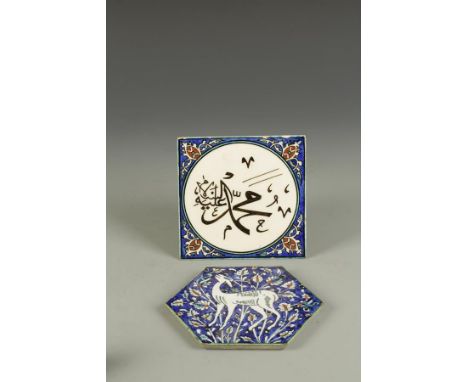 AN "ISNIC" POTTERY TILE of octagonal form with glazed polychrome decoration, a deer amongst flowers on blue ground, 7" wide, 