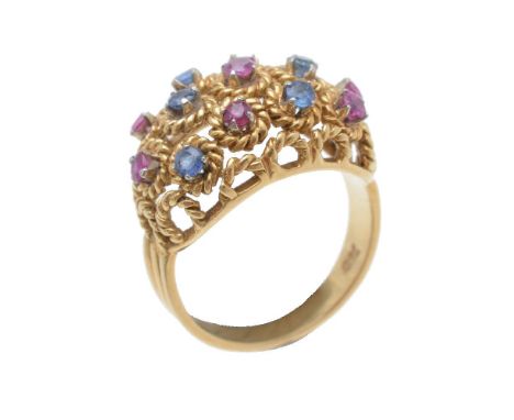 A sapphire and ruby dress ring, the panel composed of rope twist hoops, the top hoops centred with circular cut sapphires or 