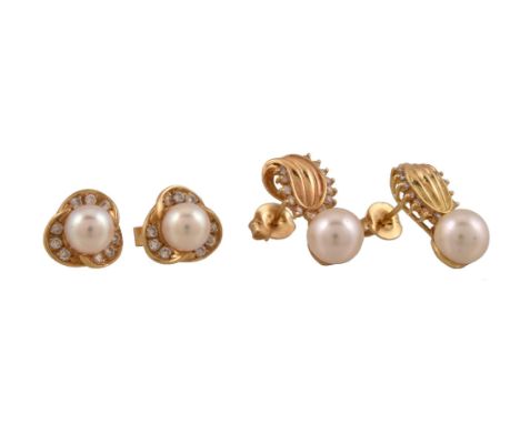 A pair of diamond and cultured pearl ear studs, the cultured pearls within a three lobed brilliant cut diamond setting, appro