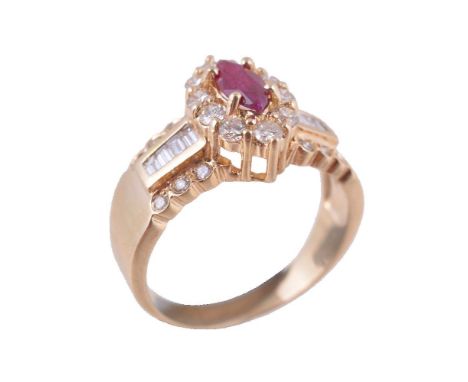 A ruby and diamond ring, the central marquise cut ruby claw set within a surround of brilliant cut diamonds, between baguette