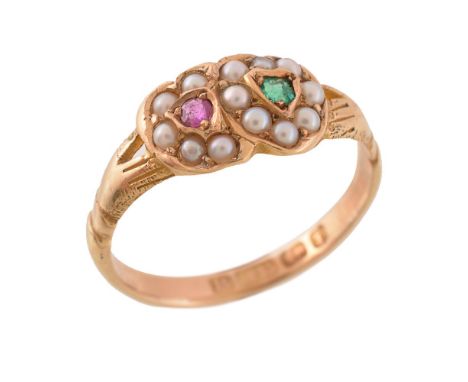 A ruby, emerald and half pearl double heart ring, the half pearl hearts each centred with a ruby or emerald, with hand shaped