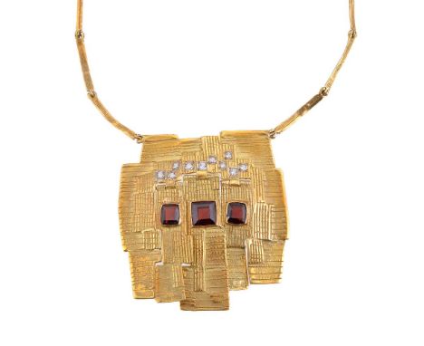 A 1970s 18 carat gold abstract pendant, the abstract panel set with three rectangular cut garnets, with circular cut white st