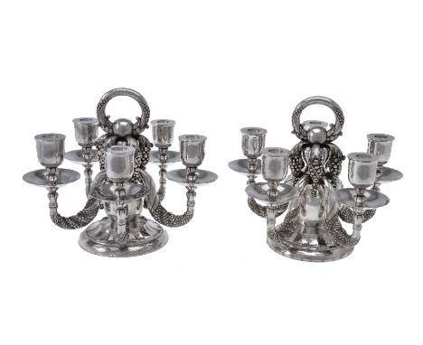 Georg Jensen, a pair of Danish silver Grape pattern candelabra, post 1945 stamped marks, design no. 383A, designed by Georg J