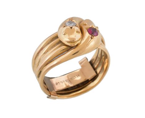 An early 20th century ruby and diamond snake ring, the two entwined serpents set with an old brilliant cut diamond and a circ