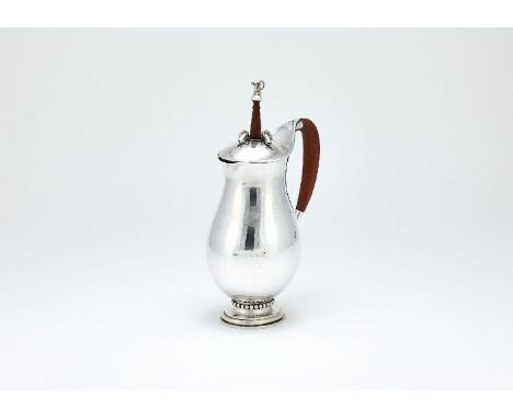 ϒGeorg Jensen, a Danish silver baluster chocolate pot or pitcher, post 1945 stamped marks, design no. 460B, designed by Georg