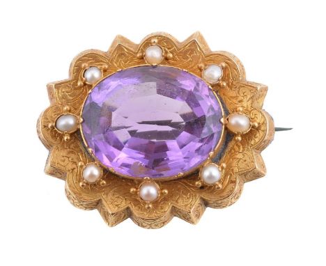 A Victorian amethyst and half pearl brooch, circa 1870, the central oval cut amethyst within a surround of beaded half pearls