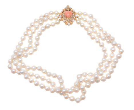 ϒA cultured pearl and coral necklace, the three row 7mm cultured pearl necklace, to the clasp set with a heart shaped coral, 