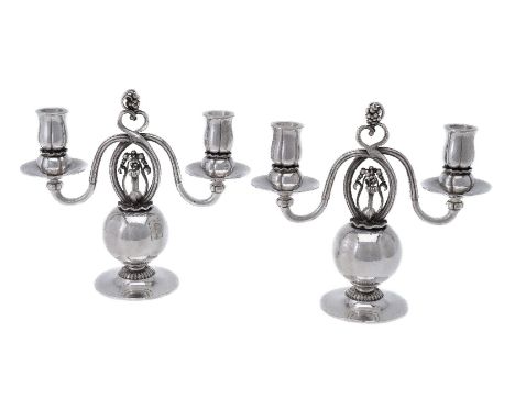 Georg Jensen, a pair of Danish silver Poppy twin light candelabra, post 1945 stamped marks, design no. 324, designed by Georg