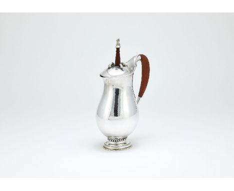 ϒGeorg Jensen, a Danish silver baluster chocolate pot or pitcher, post 1945 stamped marks, design no. 460B, designed by Georg