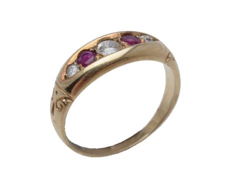 An early 20th century five stone ruby and diamond ring, the inset marquise shaped panel set with graduated old cut diamonds i