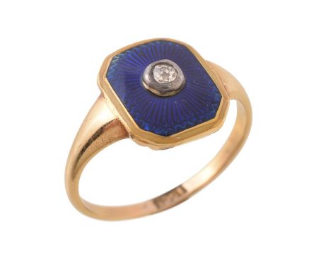A diamond and blue enamel panel ring, the rectangular blue enamelled panel with a yellow enamelled border, centred with an ol