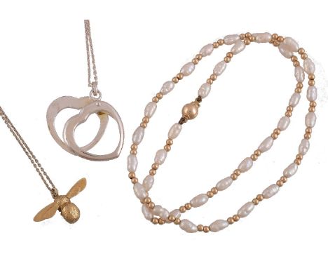 An Alex Monroe Baby Bee pendant, the gilt bee with outstretched wings, 2.3cm wide, to a belcher link chain, with disc panel s