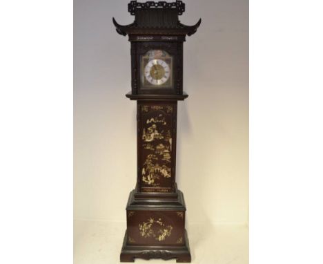 A 20th century Chinese hardwood longcase clock with mother of pearl inlay, pagoda top to hood, brass dial with silver chapter
