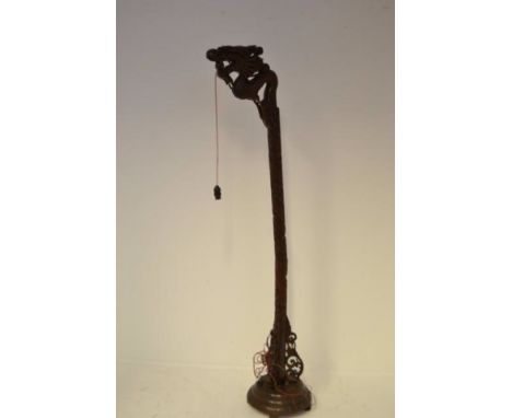 A 20th century carved hardwood standard lamp with dragon to top - H180cm CONDITION REPORT: column split and loose