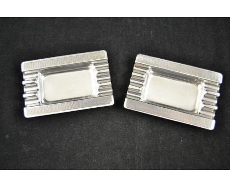 A pair of Art Deco style silver ashtrays with engine turned decoration, Birmingham 1965 - approx weight 112g/3.6 troy oz COND