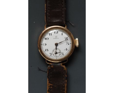 Omega - a vintage 1920s 9ct gold cased wristwatch, white enamel dial, Arabic numerals, minute track, subsidiary seconds, blue