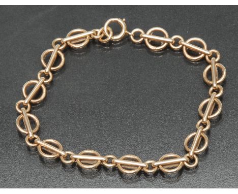 A 9ct fancy ring and bar link bracelet, Birmingham 1955, 19cm long, 10.6g gross