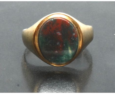 A 9ct gold blood stone signet ring, plain oval matrix, London 1976, size S, 4.5g gross