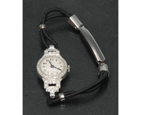 An Art Deco diamond and platinum cocktail watch, textured dial, Arabic numerals, blued hands, outer minute track, manual wind