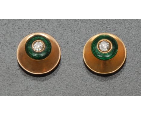 A pair of diamond and enamel shirt studs, each with a single round brilliant cut diamond, approx 0.07ct, surrounded by a gree