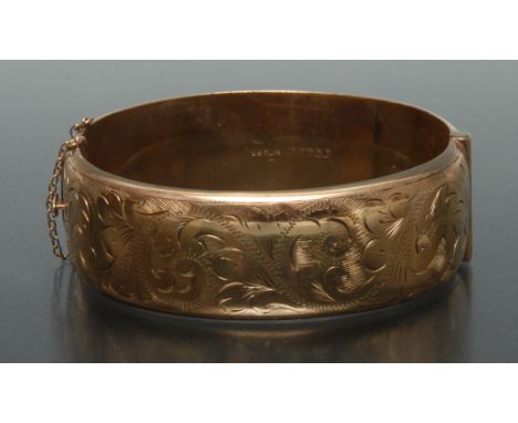 A 9ct gold wide body hinge cuff bangle, Birmingham 1964, 32g gross